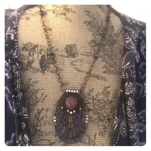 Vintage style pendant on chain with stones